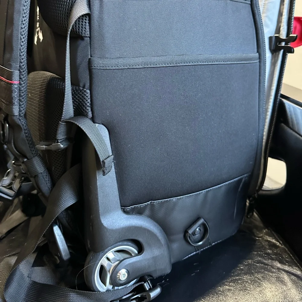 A backpack for a professional photographer. There's space for lenses